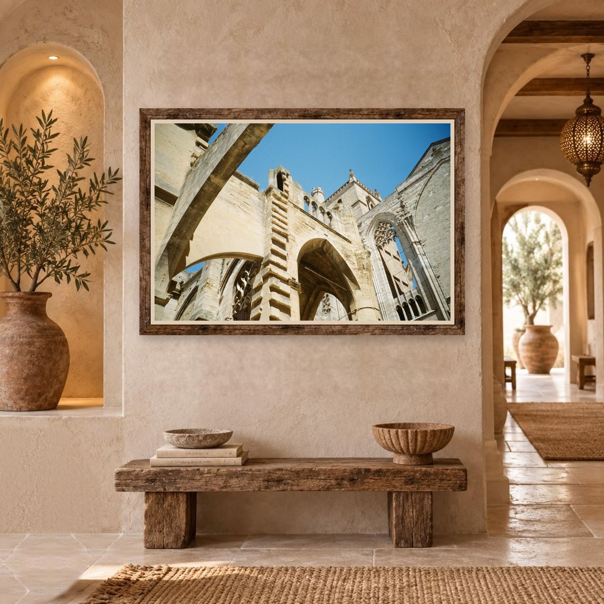 Ruined Gothic cathedral arches against a blue sky