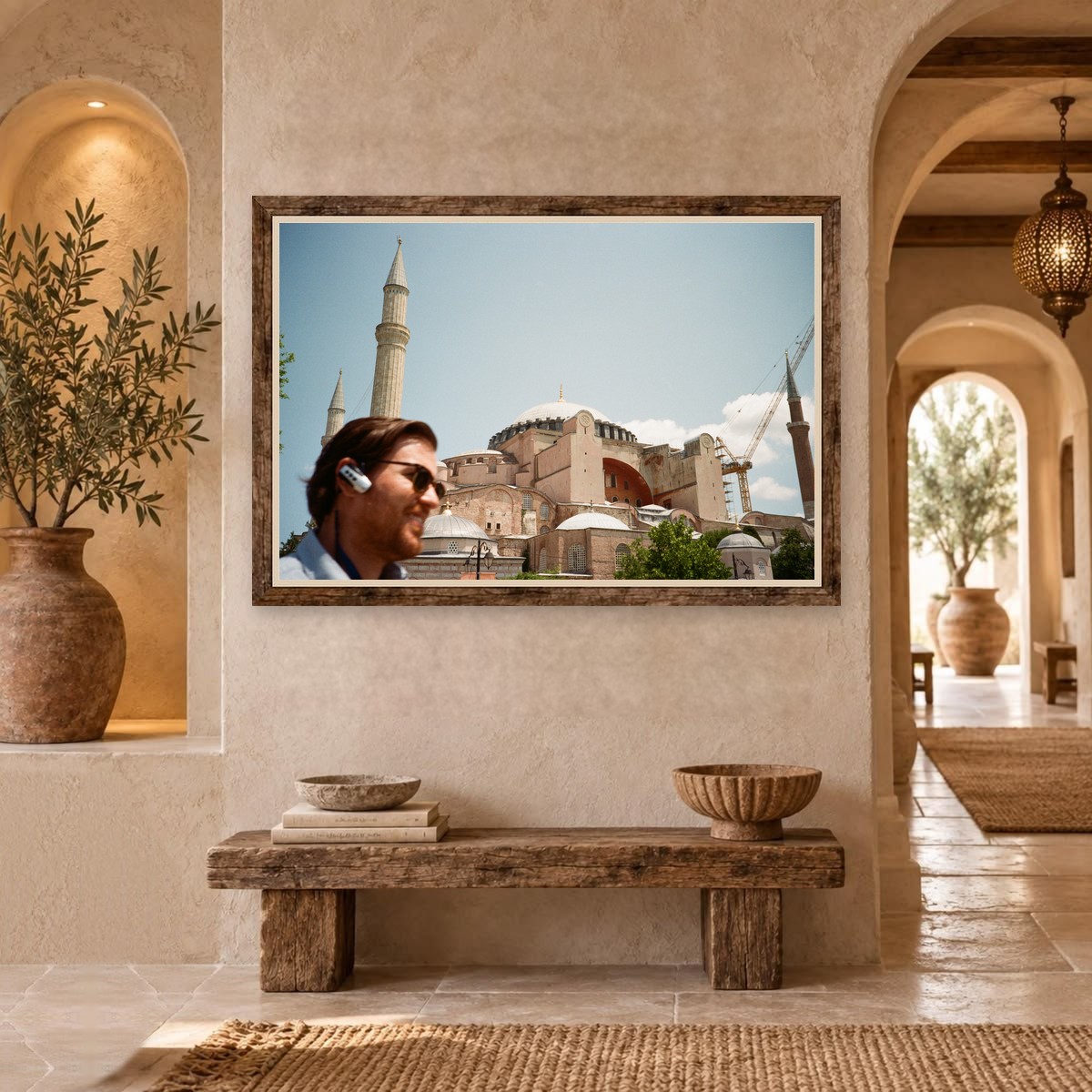 Hagia Sophia with a smiling man in sunglasses in the foreground